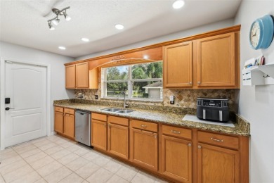 Welcome to Your Dream Home at 24548 Calusa Blvd! Discover the on Black Bear Golf Club in Florida - for sale on GolfHomes.com, golf home, golf lot