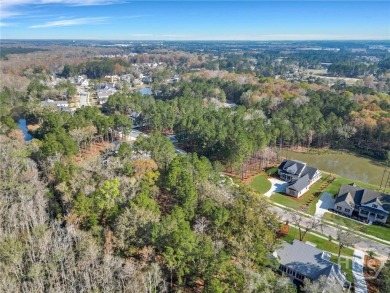 Discover the perfect blend of luxury, privacy, and natural on Savannah Quarters Country Club in Georgia - for sale on GolfHomes.com, golf home, golf lot