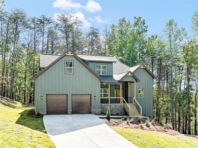 This stunning new construction blends luxury, functionality, and on The Highlands Course at Lake Arrowhead in Georgia - for sale on GolfHomes.com, golf home, golf lot