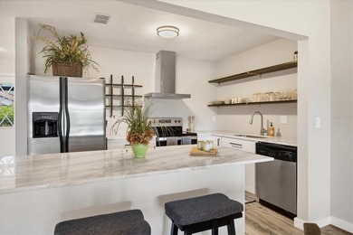 Move-in Ready! Beautifully remodeled 2-bedroom, 2-bath villa on on Capri Isle Golf Club in Florida - for sale on GolfHomes.com, golf home, golf lot