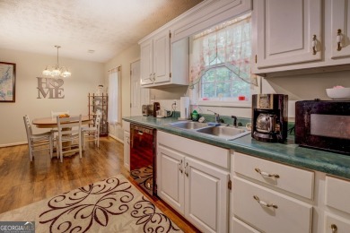 Clean well-maintained move-in ready 3/2 ranch home with a large on Turtle Cove Golf Course in Georgia - for sale on GolfHomes.com, golf home, golf lot