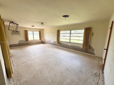 This traditional-style residence nestled in the picturesque on Plantation Inn and Golf Resort  in Florida - for sale on GolfHomes.com, golf home, golf lot