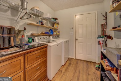 Clean well-maintained move-in ready 3/2 ranch home with a large on Turtle Cove Golf Course in Georgia - for sale on GolfHomes.com, golf home, golf lot