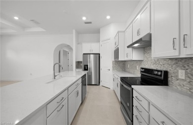 AVAILABLE NOW! This Summerwood plan is ready for move-in on River Hall Country Club in Florida - for sale on GolfHomes.com, golf home, golf lot
