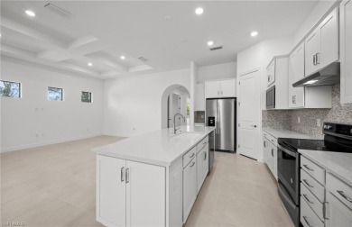 AVAILABLE NOW! This Summerwood plan is ready for move-in on River Hall Country Club in Florida - for sale on GolfHomes.com, golf home, golf lot