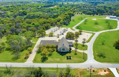 This .2 acre cleared lot in White Bluff near Lake Whitney is on White Bluff Resort - Old Course in Texas - for sale on GolfHomes.com, golf home, golf lot