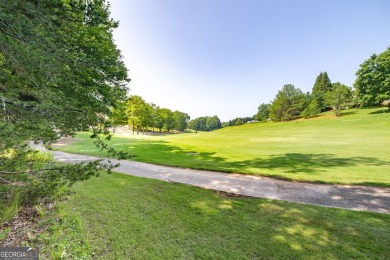 Bring your plans & build your dream home! 1 acre lot with road on The Orchard Golf and Country Club in Georgia - for sale on GolfHomes.com, golf home, golf lot