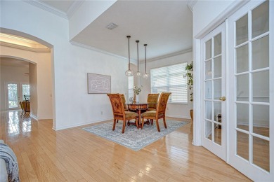 Welcome to a home that effortlessly blends timeless elegance on River Hills Country Club in Florida - for sale on GolfHomes.com, golf home, golf lot