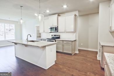 Welcome to 4063 Links Blvd - Built with Heart, Not Just a on Traditions of Braselton Golf Club in Georgia - for sale on GolfHomes.com, golf home, golf lot