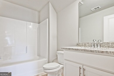 Welcome to 4063 Links Blvd - Built with Heart, Not Just a on Traditions of Braselton Golf Club in Georgia - for sale on GolfHomes.com, golf home, golf lot