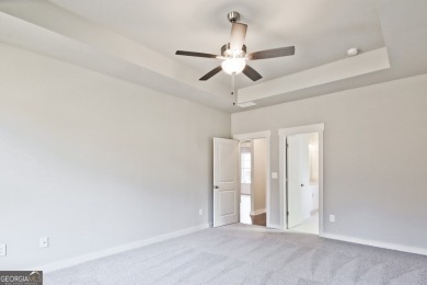 Welcome to 4063 Links Blvd - Built with Heart, Not Just a on Traditions of Braselton Golf Club in Georgia - for sale on GolfHomes.com, golf home, golf lot