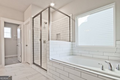 Welcome to 4063 Links Blvd - Built with Heart, Not Just a on Traditions of Braselton Golf Club in Georgia - for sale on GolfHomes.com, golf home, golf lot