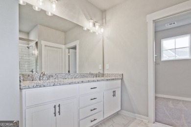 Welcome to 4063 Links Blvd - Built with Heart, Not Just a on Traditions of Braselton Golf Club in Georgia - for sale on GolfHomes.com, golf home, golf lot