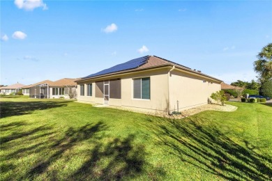 This beautifully maintained, original-owner Madeira model home on Eagle Ridge At Spruce Creek Country Club in Florida - for sale on GolfHomes.com, golf home, golf lot