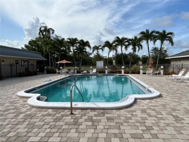 Lovely turnkey two bedroom two bath unit on third floor with on Lauderhill Golf Course in Florida - for sale on GolfHomes.com, golf home, golf lot