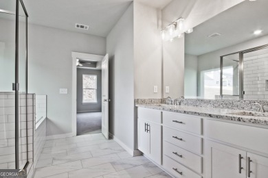 Welcome to 4063 Links Blvd - Built with Heart, Not Just a on Traditions of Braselton Golf Club in Georgia - for sale on GolfHomes.com, golf home, golf lot