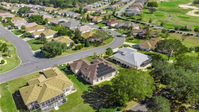 This beautifully maintained, original-owner Madeira model home on Eagle Ridge At Spruce Creek Country Club in Florida - for sale on GolfHomes.com, golf home, golf lot