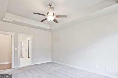 Welcome to 4063 Links Blvd - Built with Heart, Not Just a on Traditions of Braselton Golf Club in Georgia - for sale on GolfHomes.com, golf home, golf lot