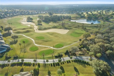 This beautifully maintained, original-owner Madeira model home on Eagle Ridge At Spruce Creek Country Club in Florida - for sale on GolfHomes.com, golf home, golf lot