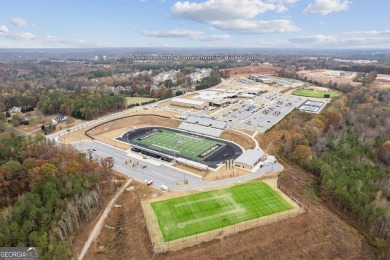 Welcome to 4063 Links Blvd - Built with Heart, Not Just a on Traditions of Braselton Golf Club in Georgia - for sale on GolfHomes.com, golf home, golf lot