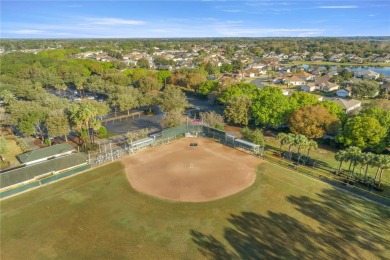 This beautifully maintained, original-owner Madeira model home on Eagle Ridge At Spruce Creek Country Club in Florida - for sale on GolfHomes.com, golf home, golf lot