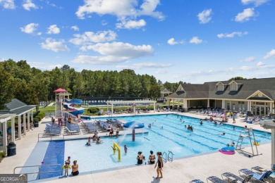 Welcome to 4063 Links Blvd - Built with Heart, Not Just a on Traditions of Braselton Golf Club in Georgia - for sale on GolfHomes.com, golf home, golf lot