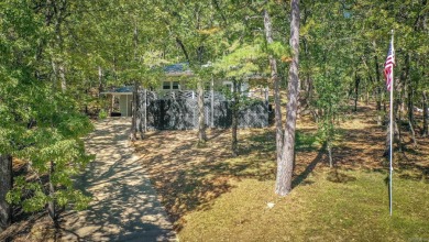 This home is currently rented.  Please call listing agent for on Indian Hills Country Club in Arkansas - for sale on GolfHomes.com, golf home, golf lot