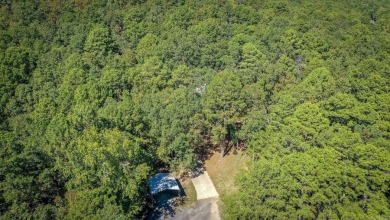 This home is currently rented.  Please call listing agent for on Indian Hills Country Club in Arkansas - for sale on GolfHomes.com, golf home, golf lot