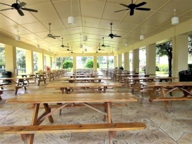 This beautifully maintained, original-owner Madeira model home on Eagle Ridge At Spruce Creek Country Club in Florida - for sale on GolfHomes.com, golf home, golf lot