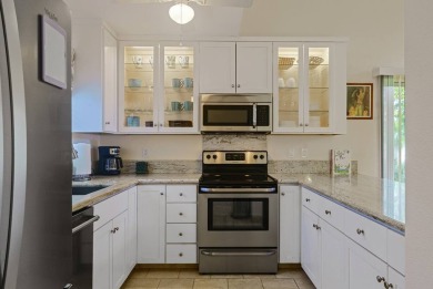 Welcome to this impressive fully furnished two-story condo with on Waikoloa Village Golf Club in Hawaii - for sale on GolfHomes.com, golf home, golf lot