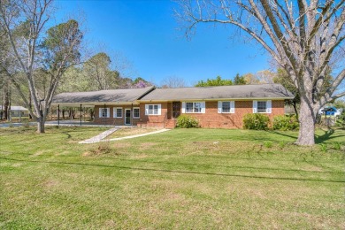 This beautiful remodeled, all brick 3 bedroom, 2 bath home with on Pointe South Golf Club in Georgia - for sale on GolfHomes.com, golf home, golf lot