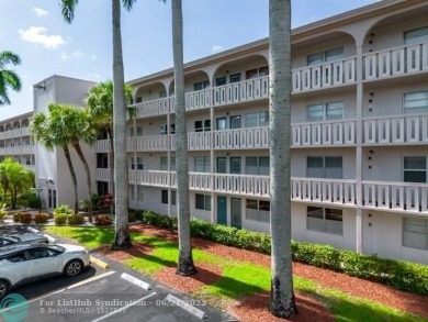 GORGEOUS! COMPLETELY REMODELED 2BEDROOM/2BATH Florida Room on Wynmoor Golf Course in Florida - for sale on GolfHomes.com, golf home, golf lot