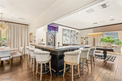 Experience luxury redefined in this spectacular 5-bedroom on Red Rock Country Club in Nevada - for sale on GolfHomes.com, golf home, golf lot