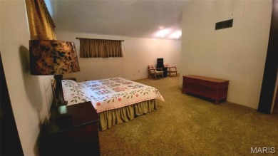 Grab this hard-to-find gem in Terre Du Lac.  This property on Terre Du Lac Golf and Country Club in Missouri - for sale on GolfHomes.com, golf home, golf lot