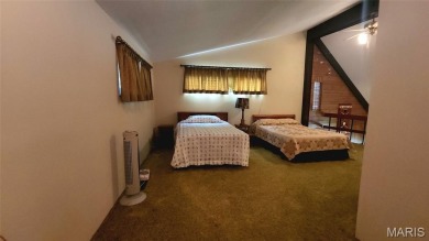 Grab this hard-to-find gem in Terre Du Lac.  This property on Terre Du Lac Golf and Country Club in Missouri - for sale on GolfHomes.com, golf home, golf lot