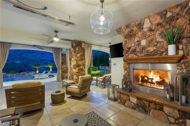 Experience luxury redefined in this spectacular 5-bedroom on Red Rock Country Club in Nevada - for sale on GolfHomes.com, golf home, golf lot