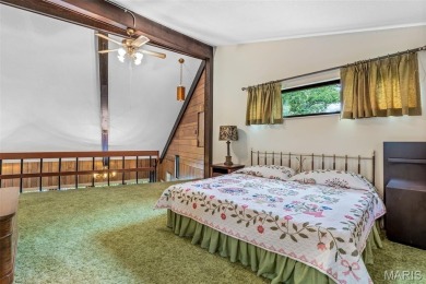 Grab this hard-to-find gem in Terre Du Lac.  This property on Terre Du Lac Golf and Country Club in Missouri - for sale on GolfHomes.com, golf home, golf lot