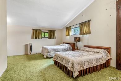 Grab this hard-to-find gem in Terre Du Lac.  This property on Terre Du Lac Golf and Country Club in Missouri - for sale on GolfHomes.com, golf home, golf lot