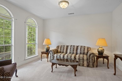 You don't need to be a golfer to enjoy the charms of this on Timberton Golf Club in Mississippi - for sale on GolfHomes.com, golf home, golf lot