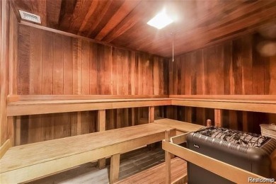Welcome to this remarkable 2-bedroom, 2-bath residence located on Evergreen Hills Golf Course in Michigan - for sale on GolfHomes.com, golf home, golf lot