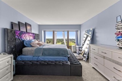 Welcome to this remarkable 2-bedroom, 2-bath residence located on Evergreen Hills Golf Course in Michigan - for sale on GolfHomes.com, golf home, golf lot