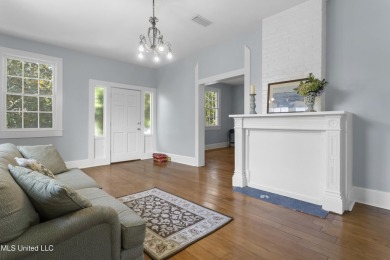 Step into the timeless charm of this beautifully preserved on Pass Christian Isles Golf Club in Mississippi - for sale on GolfHomes.com, golf home, golf lot