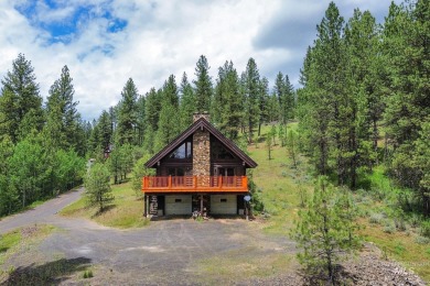 Custom, two-level True log cabin in the desirable Golf Course on Meadowcreek Golf Resort in Idaho - for sale on GolfHomes.com, golf home, golf lot