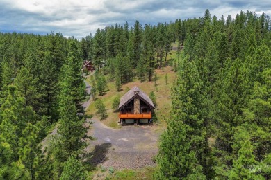 Custom, two-level True log cabin in the desirable Golf Course on Meadowcreek Golf Resort in Idaho - for sale on GolfHomes.com, golf home, golf lot