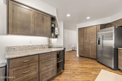 This coveted, brand-new remodel showcases exceptional quality on Forest Highlands Golf Club - The Canyon in Arizona - for sale on GolfHomes.com, golf home, golf lot