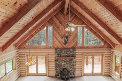 Custom, two-level True log cabin in the desirable Golf Course on Meadowcreek Golf Resort in Idaho - for sale on GolfHomes.com, golf home, golf lot