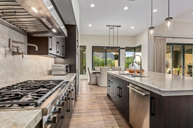 A striking example of contemporary design, this single-level on Desert Mountain Golf Club - Renegade Course in Arizona - for sale on GolfHomes.com, golf home, golf lot