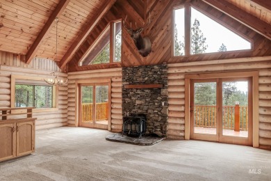 Custom, two-level True log cabin in the desirable Golf Course on Meadowcreek Golf Resort in Idaho - for sale on GolfHomes.com, golf home, golf lot