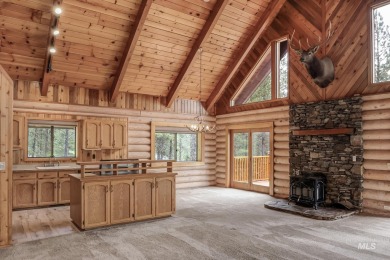 Custom, two-level True log cabin in the desirable Golf Course on Meadowcreek Golf Resort in Idaho - for sale on GolfHomes.com, golf home, golf lot