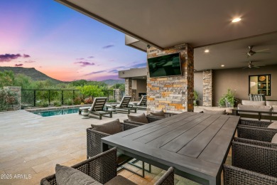 A striking example of contemporary design, this single-level on Desert Mountain Golf Club - Renegade Course in Arizona - for sale on GolfHomes.com, golf home, golf lot